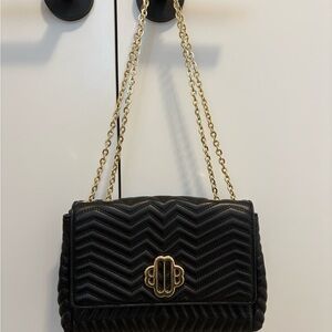 Maje « Clover » quilted leather chain bag